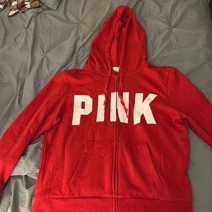 Red zip up hoodie from pink, good condition, worn once.